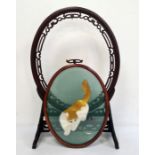 Chinese hardwood oval frame on stand with pierced and carved decoration and with associated