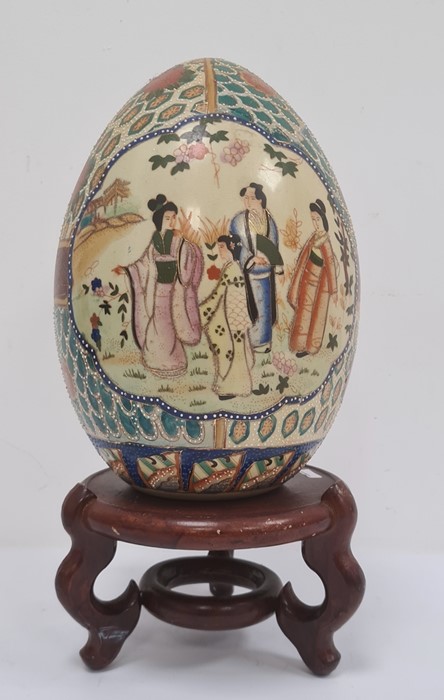 Japanese ceramic egg-pattern centrepiece, ovoid and decorated with panels of figures on a brocade - Image 2 of 2