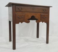 19th century oak lowboy, the rectangular top with moulded edge above one long and two short drawers,