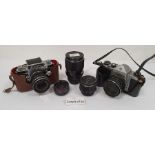Exa camera with Meyer Optic lens, a mini Rexina projector, a Photax-Paragon 1:2.8 camera lens and