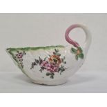 Chelsea porcelain sauce boat, leaf moulded and with curled twig-pattern handle, allover painted with