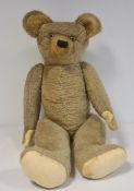 Large mohair stuffed teddy bear with plastic beaded eyes, fabric paws, 69cm long