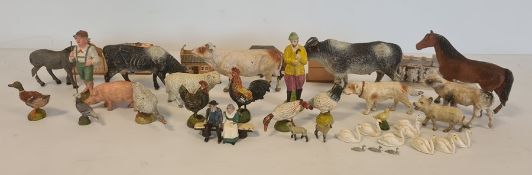 Britains lead farm animals to include farmer, swans, various farm animals and farm buildings (2