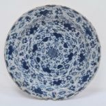 17th/18th century large Delft dish decorated with stylised flowers and leaves, 40cm diameter (with