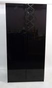 *************** withdrawn **************Modern two-door wardrobe in black polished mirror finish ,