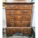 Georgian walnut chest on stand with ogee moulded cornice above two short and three long strung