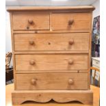 20th century pine chest of two short over three long drawers, on plinth base, 66W x 76H x 35.5D cm