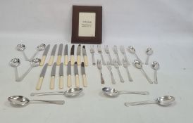 Quantity of silver-plated cutlery, a leather photograph frame and Coalport cabinet cups and saucers