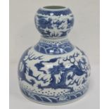 Chinese porcelain double-gourd vase with broad flat base and underglaze blue decoration of dragons