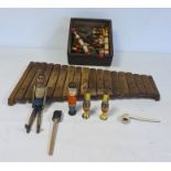 Wooden xylophone, wooden jointed figure of a man, wooden skittles, marbles and miniature child's