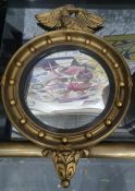 Modern circular wall mirror surmounted by eagle, moulded frame