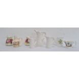 Set of three Royal Worcester ivory porcelain leaf moulded graduated jugs, pair Royal Worcester