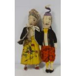 Pair of late 19th/early 20th century cloth Punch and Judy dolls, he with velvet jacket and she