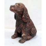 Painted concrete model of a seated dog, 37cm high