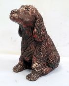 Painted concrete model of a seated dog, 37cm high