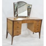 Heals of Tottenham Court Road, London dressing table with three-part mirror and shaped top, above