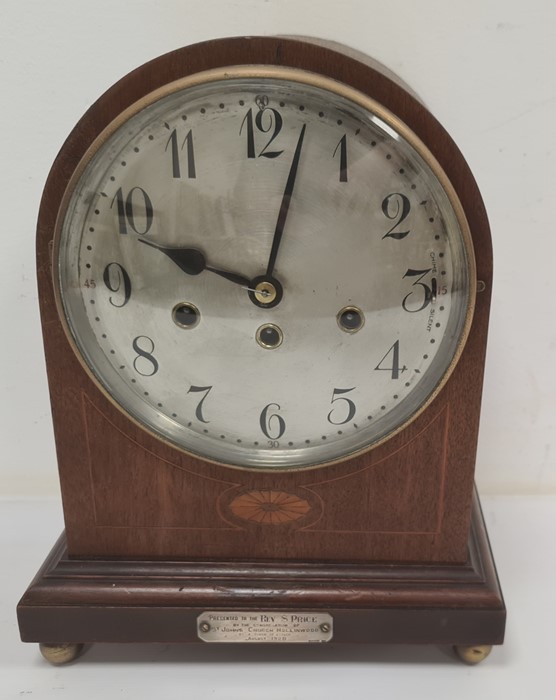 20th century mantel clock  by 'Junghans' in mahogany, the arched top body with Arabic numerals to