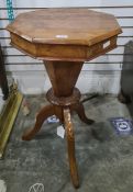 19th century walnut sewing table, the octagonal top lifting to fitted interior, on tapering