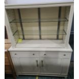 20th century cream painted steel medical cabinet, made in Japan and labelled 'US Property'  the