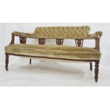 Victorian sofa upholstered seat and back, turned and ringed front legs to brown china