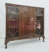 20th century mahogany lounge unit, the rectangular top above moulded edge, central fall and cupboard