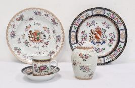 Two Sampson porcelain armorial plates in 18th century Chinese style, a similar ovoid vase and cover,