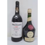 Bottle of Benedictine liqueur and a bottle of Graham's 1983 Vintage Port