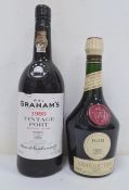 Bottle of Benedictine liqueur and a bottle of Graham's 1983 Vintage Port