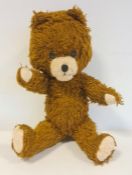 20th century brown teddy bear with squeak, 41cm long