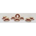 Set of seven Royal Worcester 'Diana' pattern coffee cups and eight saucers, maroon ground with