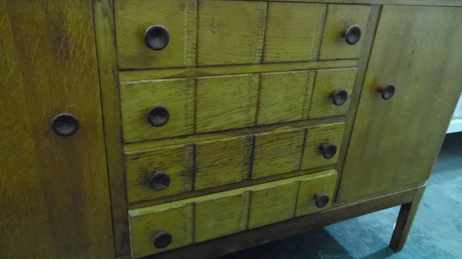 Gordon Russell oak sideboard with four central drawers flanked by cupboard doors, shaped legs, - Image 7 of 14