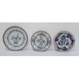 Three various Chinese porcelain plates, variously decorated in principally iron-red and blue, with