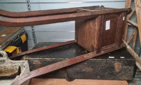 A carpenter's tool chest containing 3 vintage wooden planes of varying size, chisel, twist drills