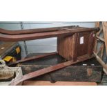 A carpenter's tool chest containing 3 vintage wooden planes of varying size, chisel, twist drills