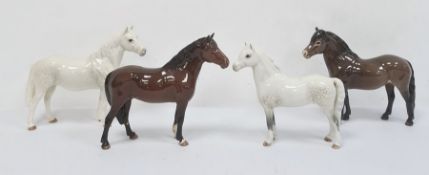 Four Beswick ceramic model ponies "Welsh", "Connemara", "Exmoor" and one other (4)  Condition