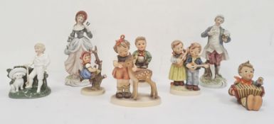 Five Hummel / Goebel figures of children, and three further continental china figures (8)Condition