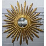 Large modern sunburst mirror, the central circular mirror approximately 28cm diameter, overall