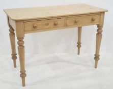 Late 19th/early 20th century pine side table, the rectangular top with rounded front corners above