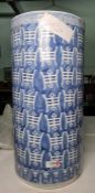 Ceramic umbrella stand in the Chinese style, 46cm high and a black painted wine rack (2)