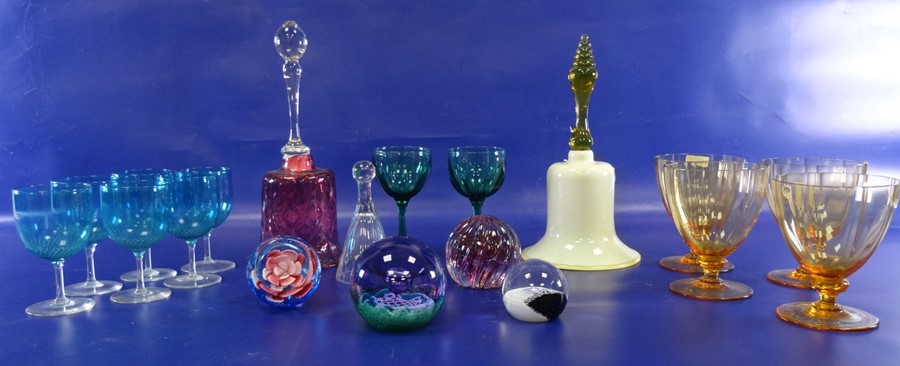 Four assorted paperweights to include Caithness 'Optics' R588, assorted coloured wines, two glass