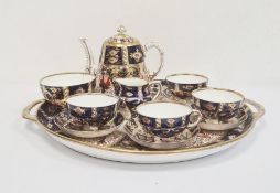 19th century Imari palette part tea service comprising of teapot, four cups and saucers, milk jug