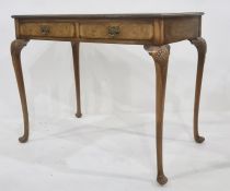 Early 20th century walnut desk with leather inset to rectangular top, moulded edge, two drawers