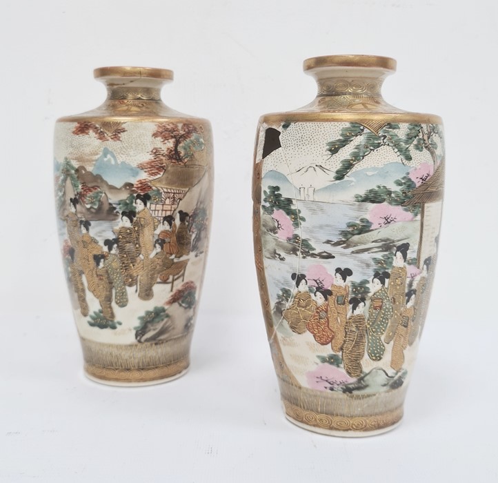 Pair Satsuma pottery vases, female figure decorated in mountainous river landscapes (very