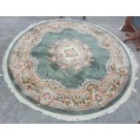 Modern Chinese superwash rug, the green ground with central medallion, stepped border decorated with