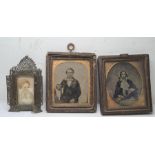 Late 19th/early 20th century small photograph frame with pierced architectural surround, two