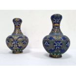 Pair 20th century Chinese cloisonne enamelled vases, baluster shaped and with blue and white lotus