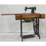 Treadle sewing machine by Youth