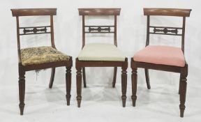 Set of four 19th century rosewood dining chairs with cane seats, on turned and reeded front legs