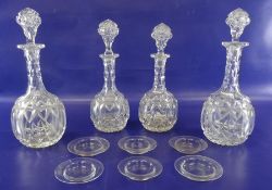 Set of four ( 2 pairs) graduated cut glass wine decanters and a box of miniature glass dishes