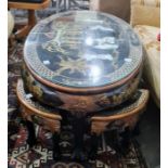 Modern Chinese style oval coffee table with nesting tables under, black ground and gilt decorated